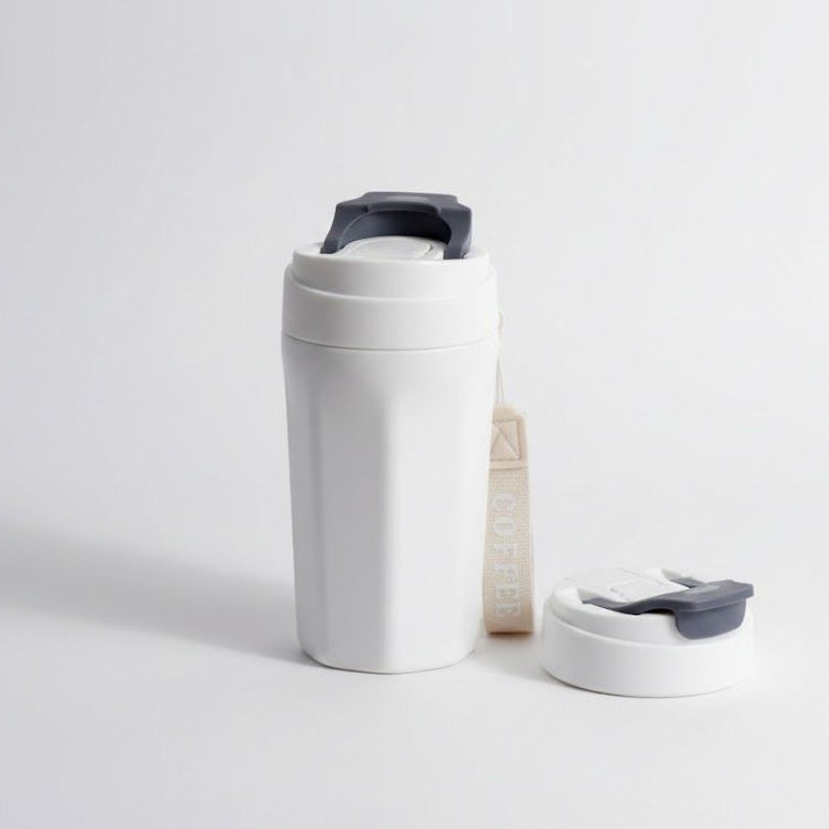 Glass sipper mug with outer Plastic body